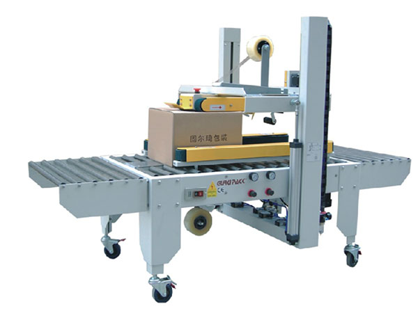 nên mua máy dán băng keo thùng carton tự động hay không