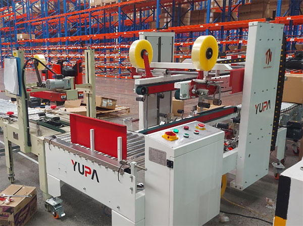 nên mua máy dán băng keo thùng carton tự động không